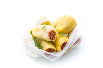 peppers stuffed raw frozen on a white background
