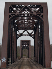 Abandoned railway bridge, iron bridge crossing the river