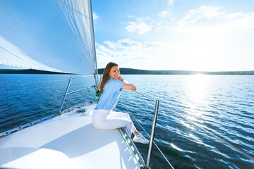 Woman Sitting On Yacht Relaxing Looking At Sea Sailing Outdoors