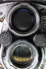detail of old camera on black background