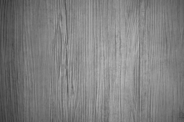 Wooden wall with texture and grain in dark black and white tone for background and decoration Cool banner on page and cover