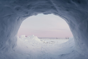 The view from the igloo to the snowy lake