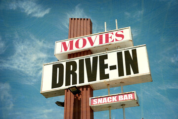 Aged and worn vintage drive-in moves sign