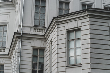 Close up of big windows of manor. Texture of windows of historic white Palace.