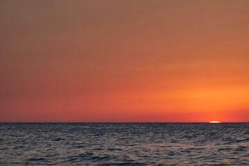 Naklejka premium Sunset at Cala El Frailecillo in the Calas de Roche de Conil de la Frontera. Cadiz Andalusia. Spain