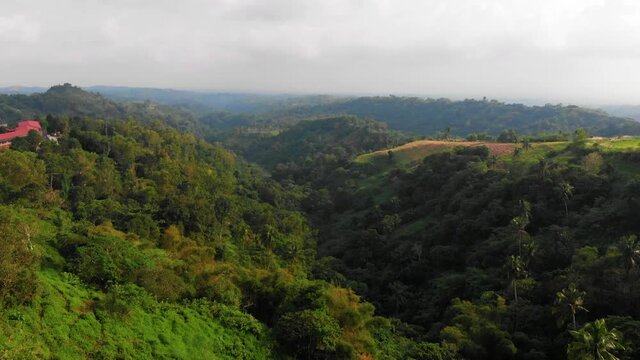 Rising aerial reveal of stunning mountainous scenery in Nasugbu, Batangas