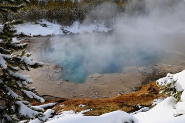  Steaming turquoise water of Emerald Spring in Norris Geyser Basin Yellowstone Nation Park in winter