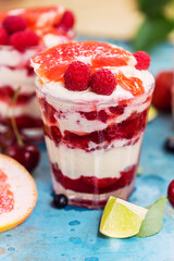 Desserts with sweet strawberry, raspberry, ice cream and grapefruit