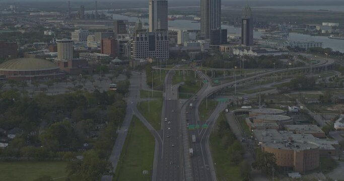 Mobile Alabama Aerial v16 tilt up reveal of interstate 10 towards downtown city skyline - DJI Inspire 2, X7, 6k - March 2020