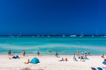 Fototapeta na wymiar ES TRENC, Majorca, Spain - 25 JULY 2020 - People enjoying summer day on hotspot beach in Majorka.