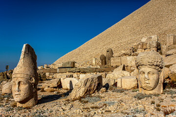 Antique statues on Nemrut mountain, Turkey. The UNESCO World Heritage Site at Mount Nemrut where...