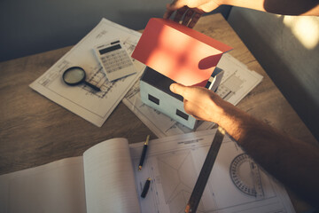 architect hands working on blueprint inspection in workplace
