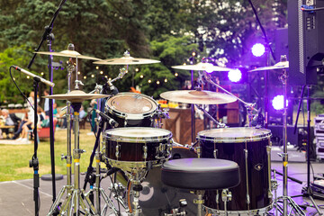 Outdoor drum kit. Percussion instruments, drum, cymbals. Rock  concert