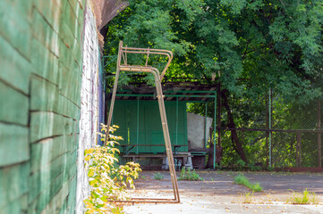Abandoned sports ground with a judge's seat