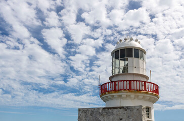 Old lighthouse on the coast of Ireland. County Wicklow.
