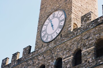 Fototapeta na wymiar A Clock Tower in Italy
