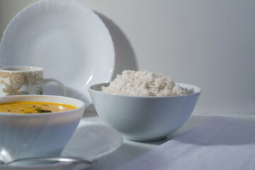 White rice with delicious south Indian style mango curry, white background