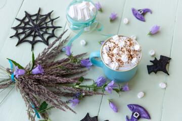 Morning holiday coffee for Halloween with marshmallows.