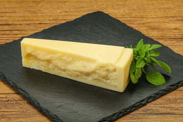 Hard parmesan cheese served basil