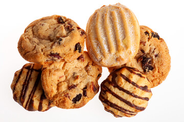 Assortment of biscuits isolated on white background. Different sorts of cookies  for Christmas and other celebrations 