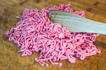 Mince on kitchen wood and palette