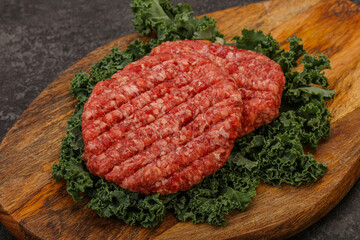 Raw beef burger cutlet for cooking