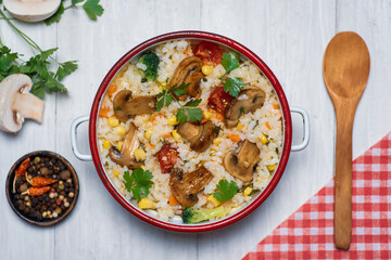 Vegetarian risotto with mushrooms and vegetables on a plate