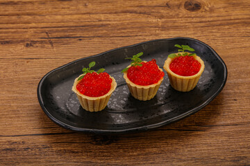 Apetizer - tartlet with red caviar