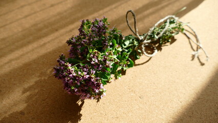 oregano bouquet liying on the table, marjoram bouquet