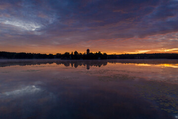 island ancient monastery in the middle of the lake at sunrise