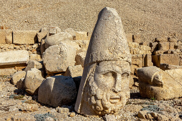 Antique statues on Nemrut mountain, Turkey. The UNESCO World Heritage Site at Mount Nemrut where...