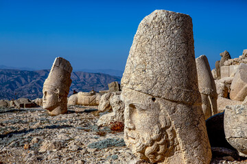 Antique statues on Nemrut mountain, Turkey. The UNESCO World Heritage Site at Mount Nemrut where...