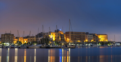 Lights of the seaside town. Taranto.