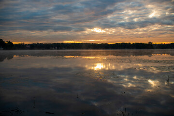 island ancient monastery in the middle of the lake at sunrise