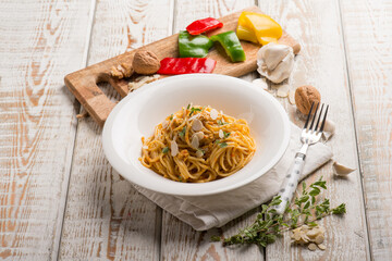 spaghetti with capsicum pest with nuts and almond