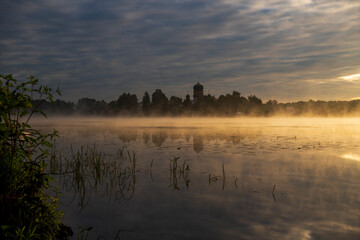 island ancient monastery in the middle of the lake at sunrise