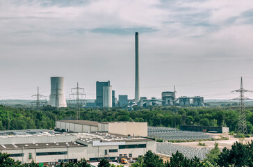 Fototapeta premium View over industrial district to cogeneration plant in Herne, NRW, Germany