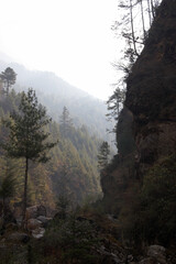 Obraz na płótnie Canvas Deep ravine with morning mist, Everest trail, Himalayas, Nepal