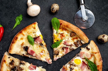 Pizza carbonara with bacon, cheese, mushrooms, quail eggs, creamy sauce on a stone background