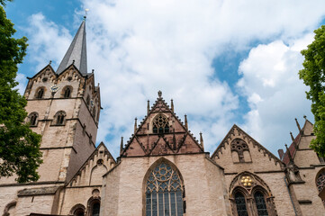 Fototapeta na wymiar Kirchturmspitze an einer Kirchen Architektur