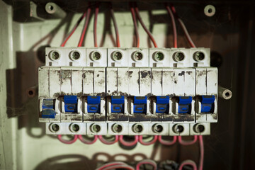 old and dusty electrical switch panel. damaged wires at switchers need to replace. fire safety...