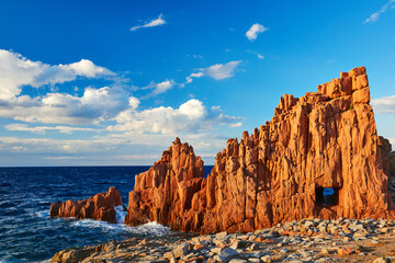 Fototapeta na wymiar Sardinia sea marine landscape with red rocks in Arbatax