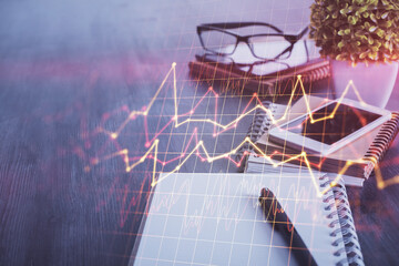 Double exposure of forex chart drawing and cell phone background. Concept of financial trading