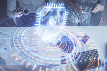 Double exposure of man and woman working together and data theme hologram drawing. Computer background. Top View.