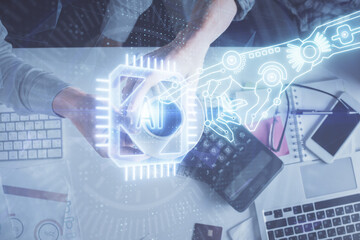 Double exposure of man and woman working together and data theme hologram drawing. Computer background. Top View.