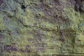 Rock covered with sulfur