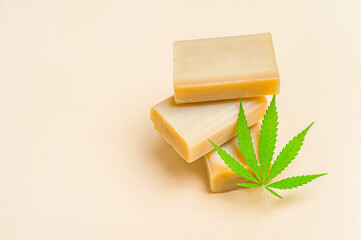 Homemade hemp soap and green leaf of marijuana. Spa organic soap. Organic skincare product with medicinal CBD.