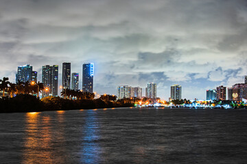 Fototapeta na wymiar Miami City Skyline viewed from Biscayne Bay. Miami night downtown.