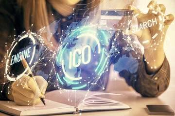 Fototapeta premium Multi exposure of woman on-line shopping holding a credit card and crypto theme drawing. Blockchain E-commerce concept.