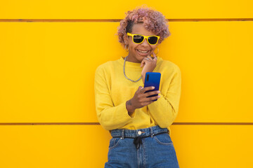young afro american girl with with mobile phone